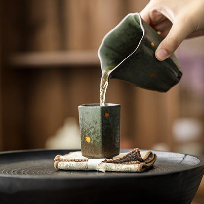 Ceramic-Mini-Cups-with-Golden-Flakes-in-hand-green-3