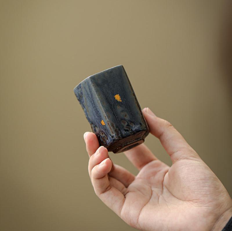 Ceramic-Mini-Cups-with-Golden-Flakes-in-hand