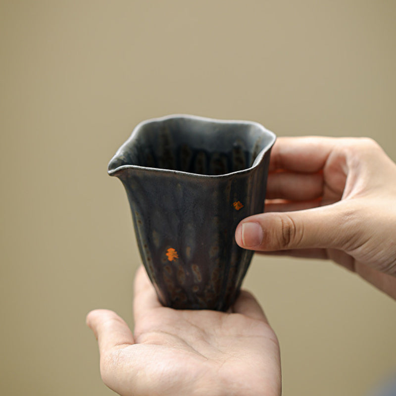 Ceramic-Pitchers-with-Golden-Flakes-in-hands