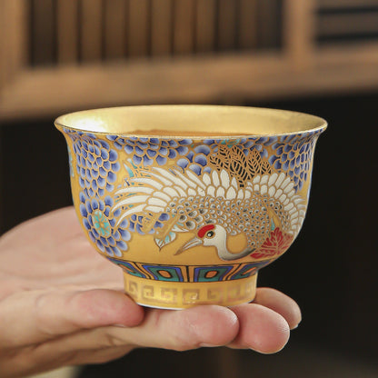 Gilt-Porcelain-Bowl-with-Crane-on-hand