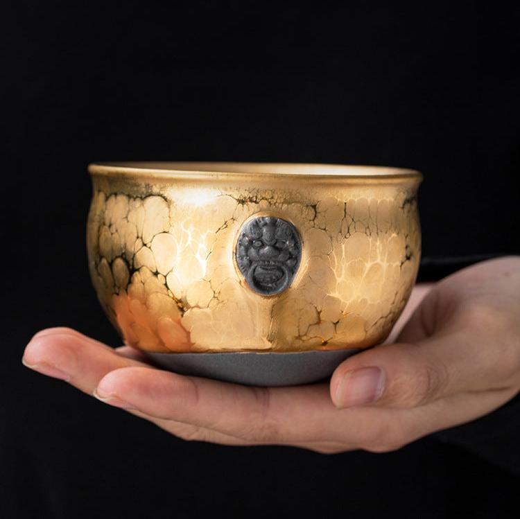 God-Beast-Golden-Glazed-Ceramic-Bowl-on-hand