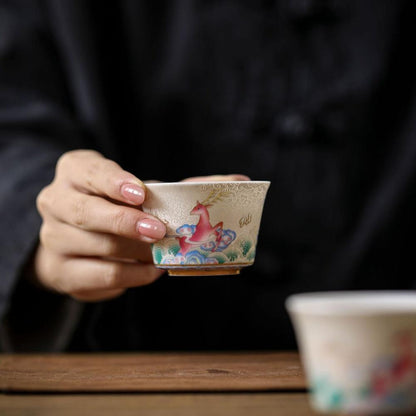 Silver-Detailing-Porcelain-Cups-with-Fairy-Animals-in-hand