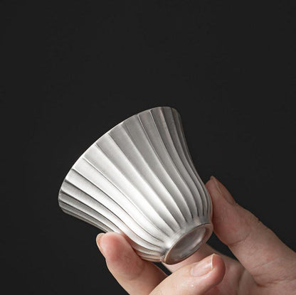 Silver-Gilt-Ceramic-Mini-Cups-top-in-hand