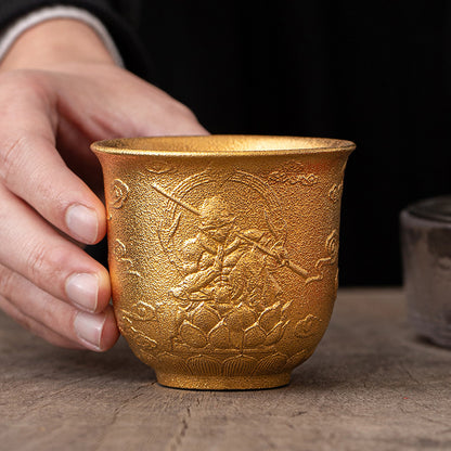 aureatoir.com-Gold-Painting-Ceramic-Cup-with-Wukong-Relief-in-hand