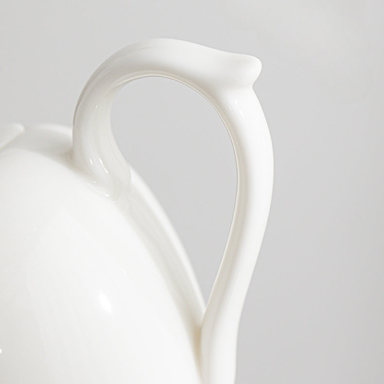 Mutton-Fat Porcelain Slouch Shoulder Teapot close-up shot of the handle