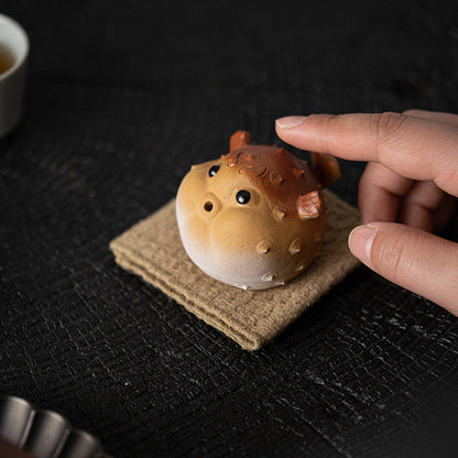 Purple-Sand Mud Puffer Fish Incense Holder on a Linen Tea Cloth