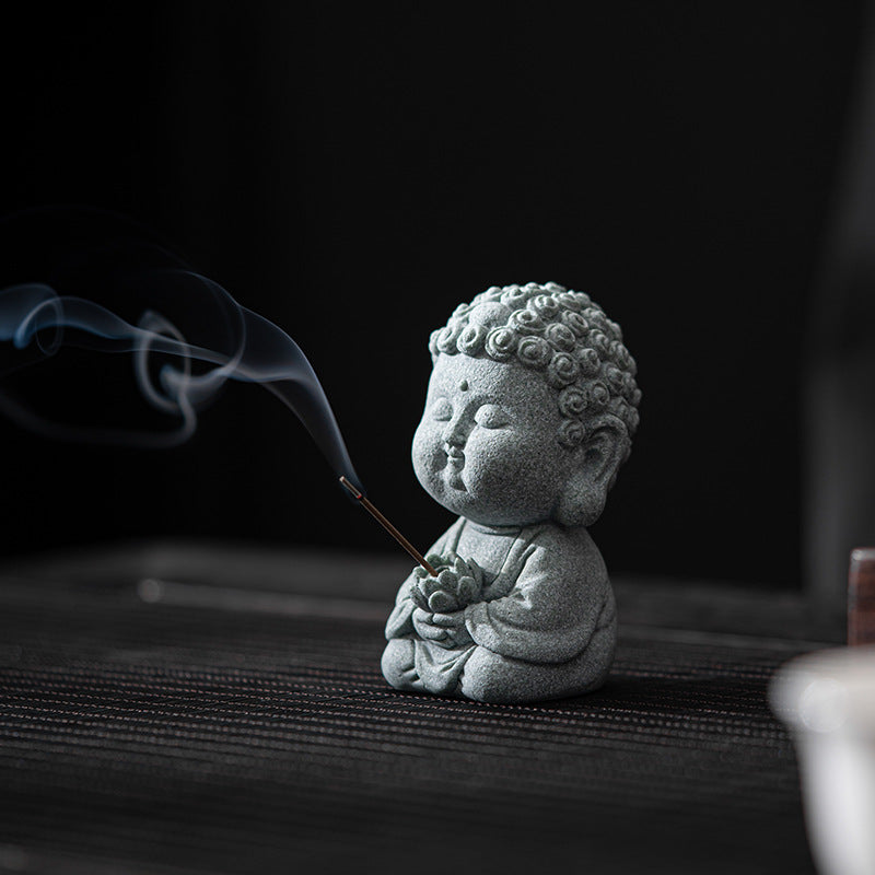 Side View of the Sandstone Buddha Decor Incense Holder holding a burning incense