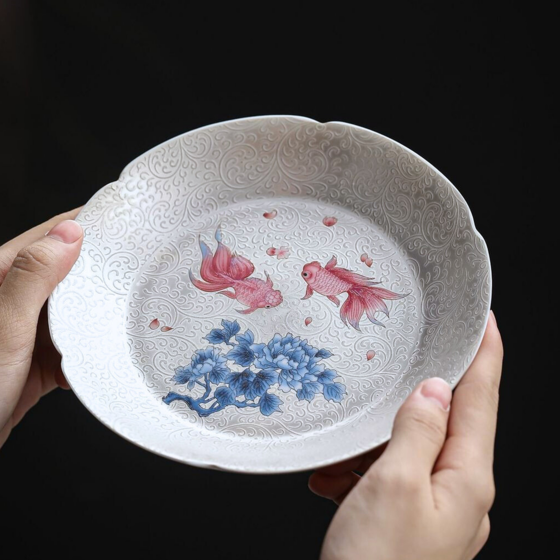 silver-enamel-koi-fish-plate-in-hand